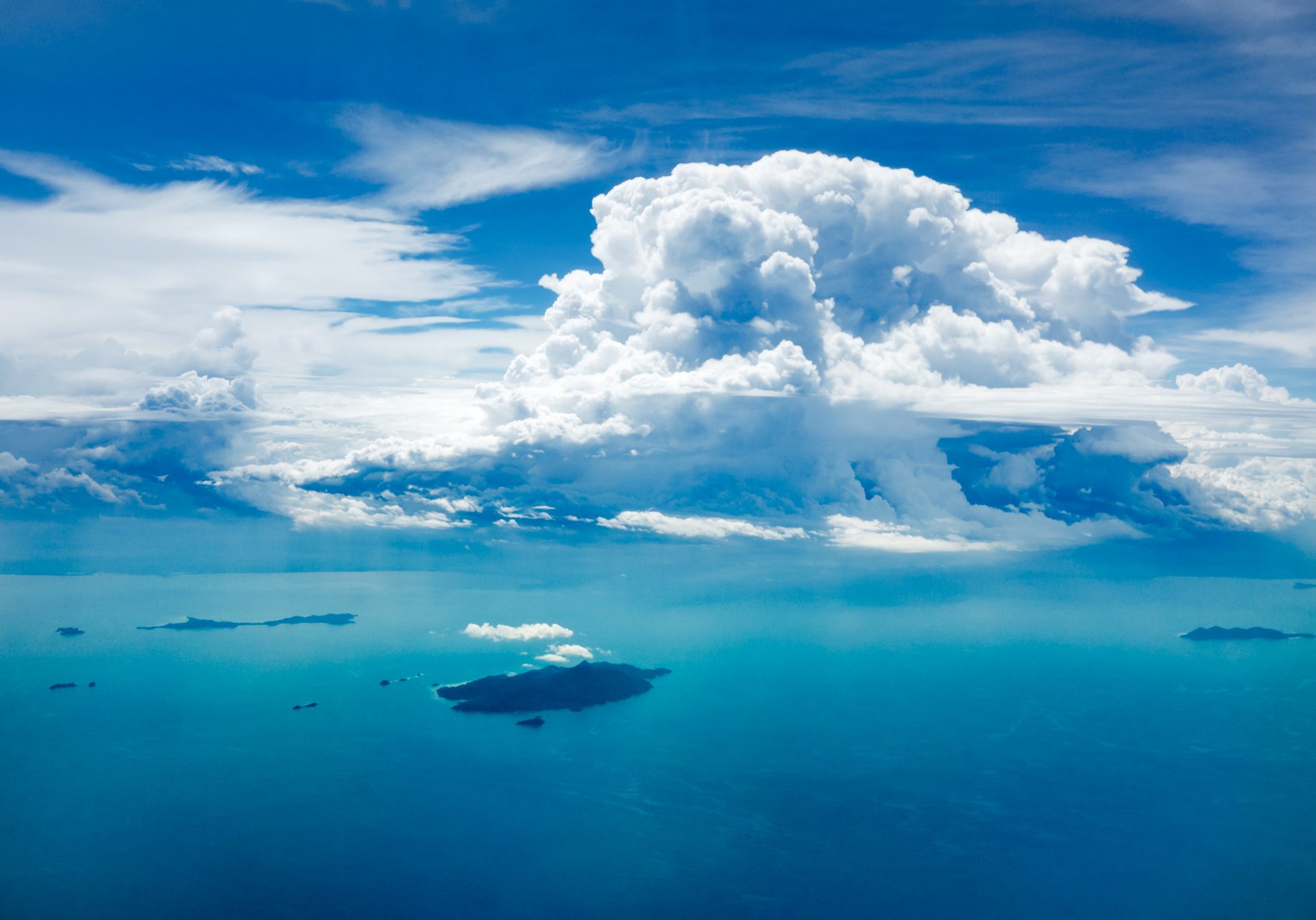 View of clouds and islands in the ocean